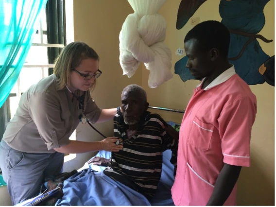 doctor examining patient