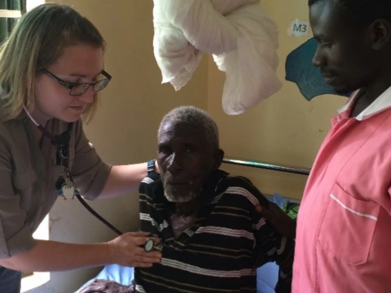 doctor examining a patient with stethoscope