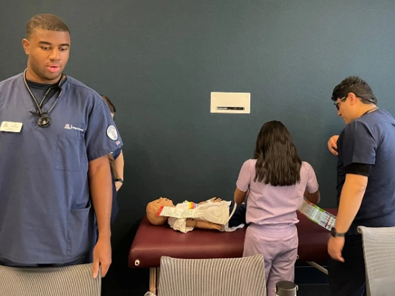 medical students in a simulation lab