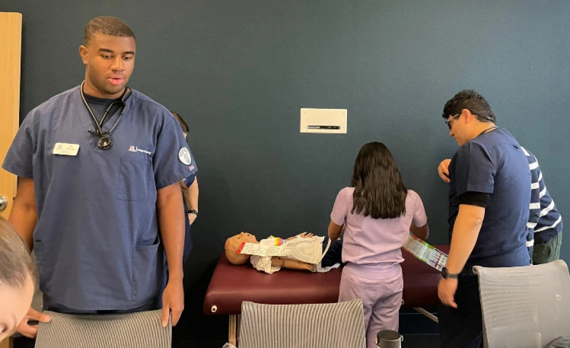 medical students in a simulation lab